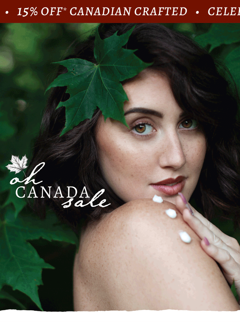 Brunette person with leaf on head and dots of lotion on arm with blurred background. Text overlay reads 'oh Canada Sale' and 'Celebrate Canadian craft with us - 15% off* Canadian crafted' on red banner. 