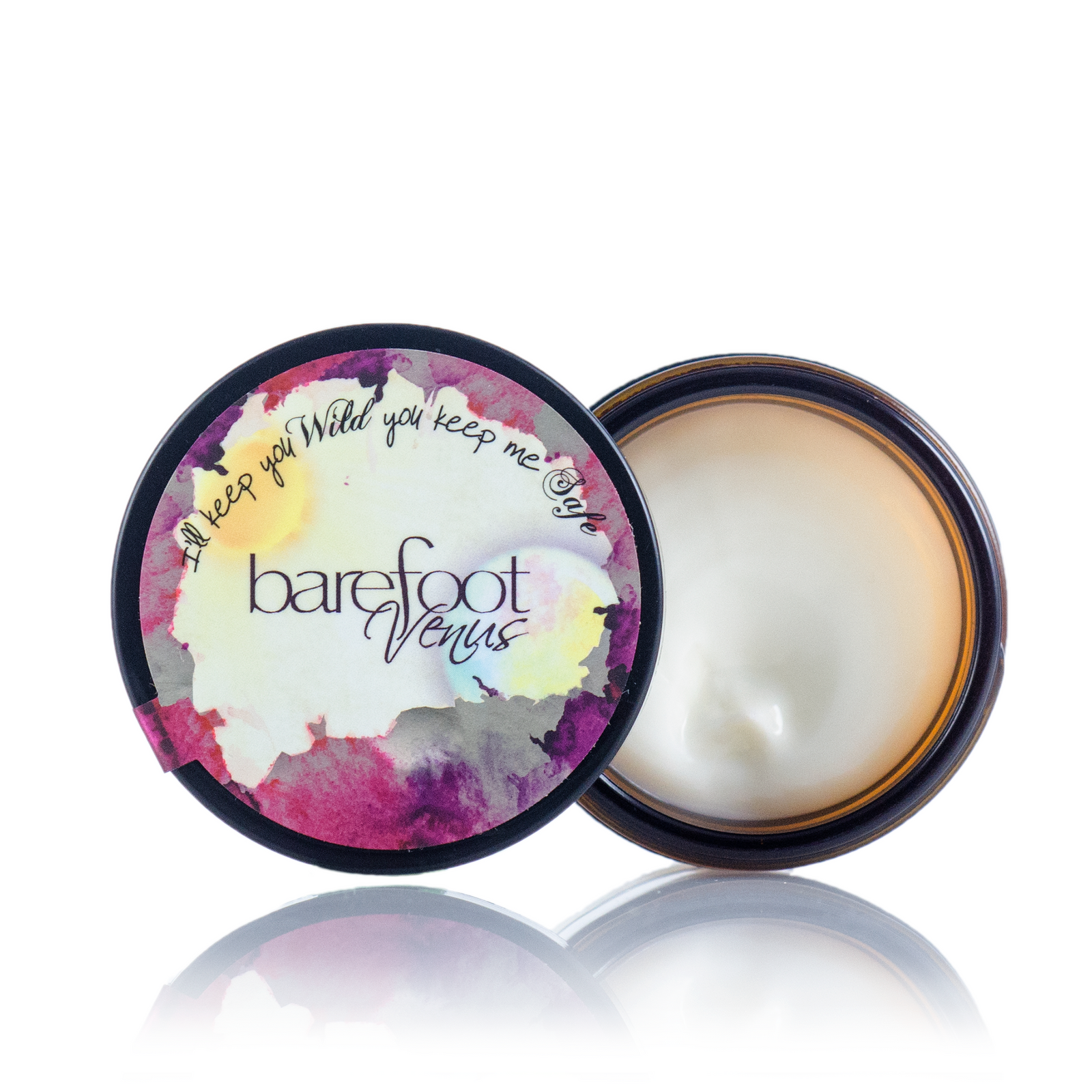 A jar of Barefoot Venus Black Coconut instant hand repair with a black lid and a zebra floral design.